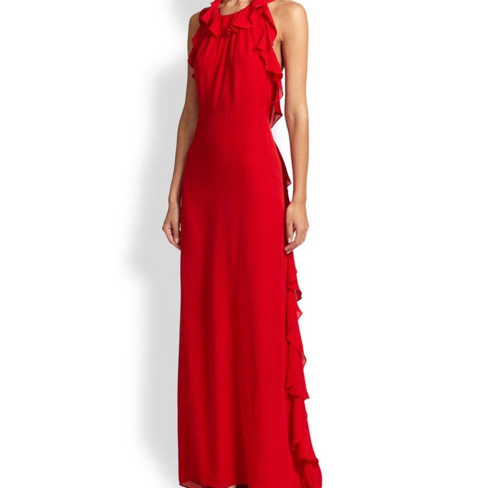 Red halter gown with frill detail and open back. Size 10.